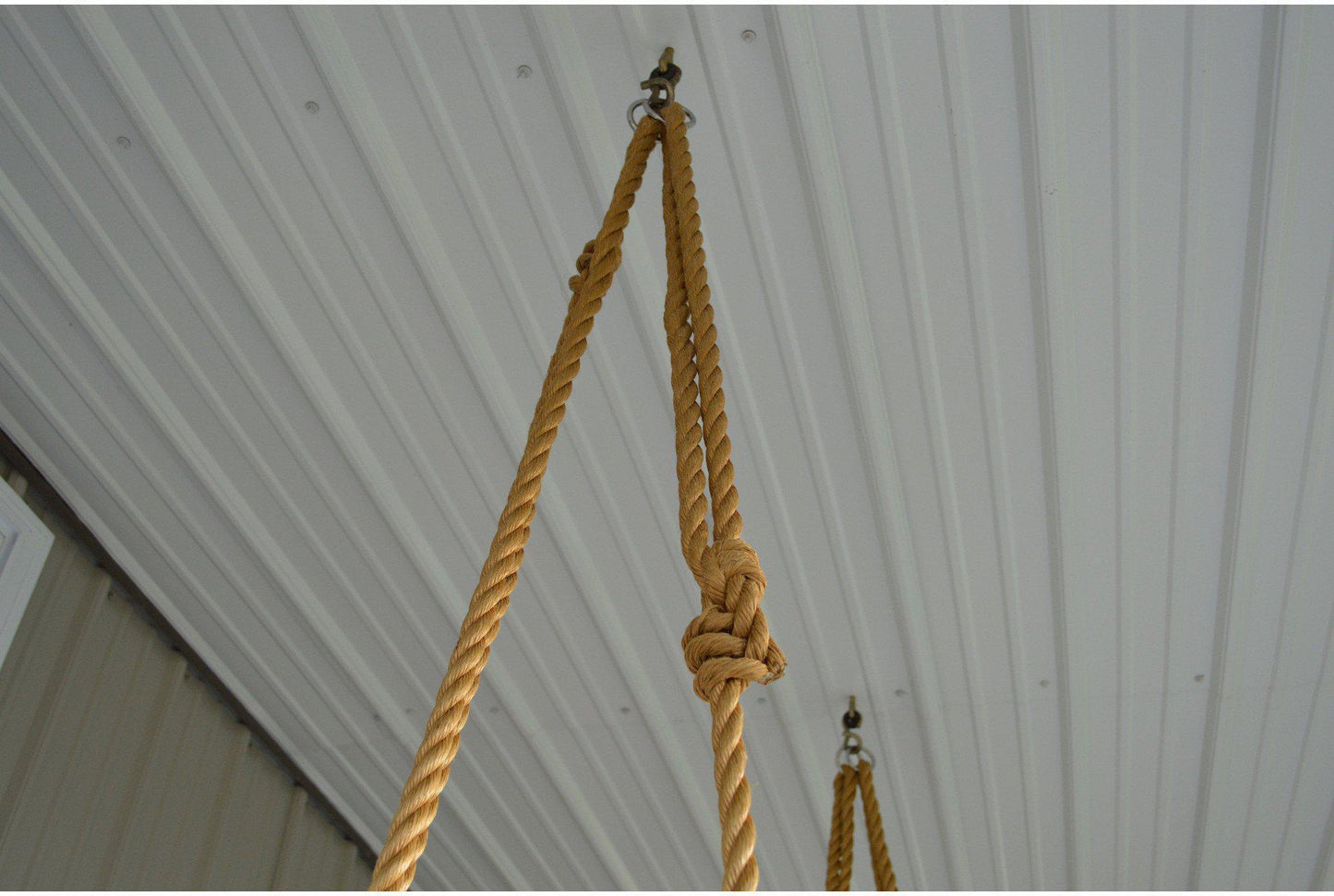 swing rope attached to hooks at ceiling